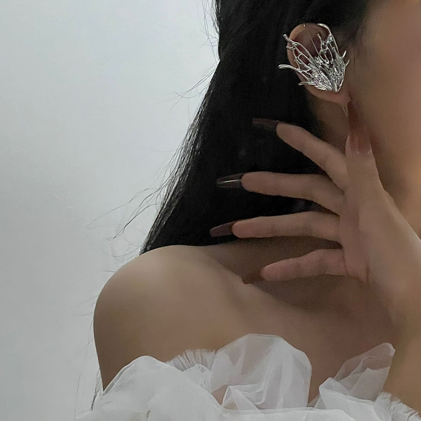 Liquid metal butterfly ear bone clip earrings, one piece, light luxury, small design, cool wind earrings