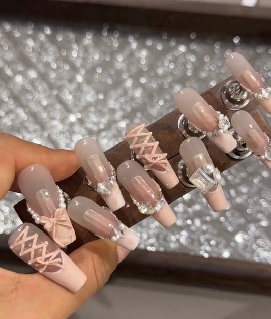 Swarovski pink strap bow nails