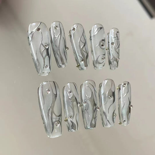 Silver Bullet Flowing Liquid Mechanical Nail