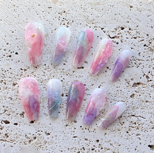 Clouds and mist stain the nails.