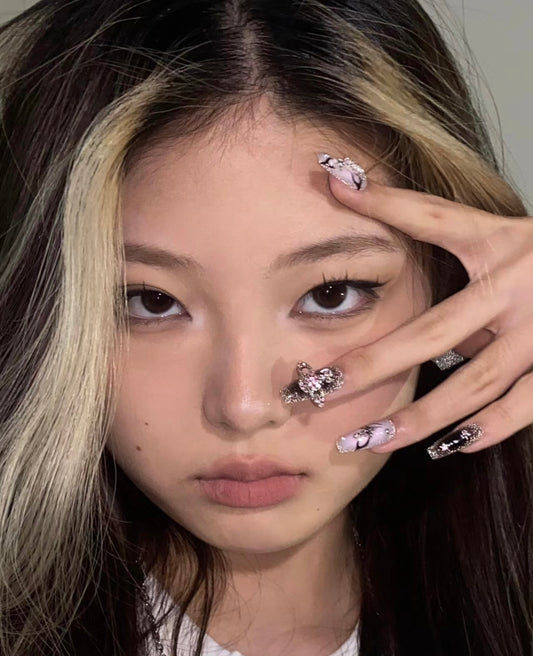 "Cosmic Elegance: Glittering Orbit & Star Nail Design"