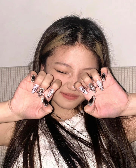 "Cosmic Elegance: Glittering Orbit & Star Nail Design"