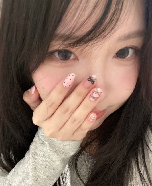 Chic & Playful Polka Dot and Bow Nail Design