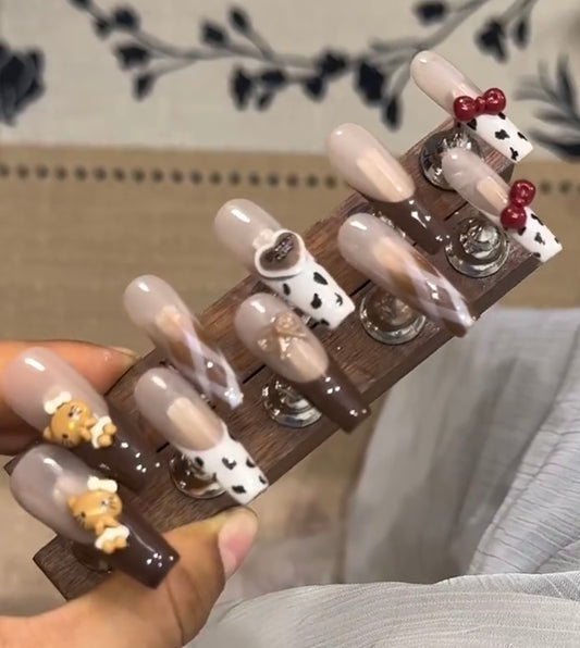 Autumn cow pattern hello Kitty nails