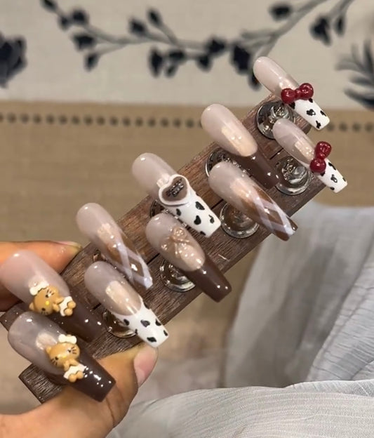Autumn cow pattern hello Kitty nails