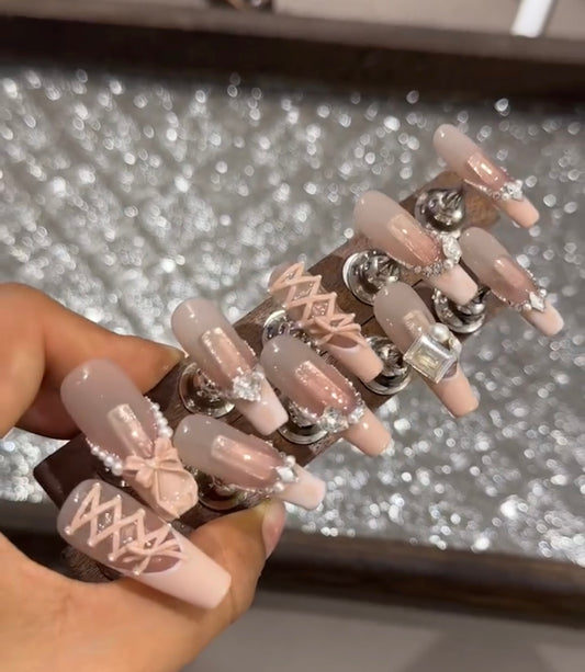 Swarovski pink strap bow nails