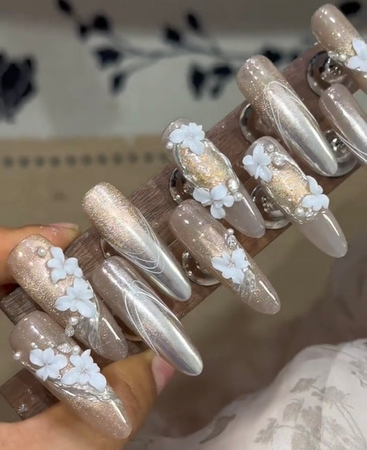 White carved nails in autumn