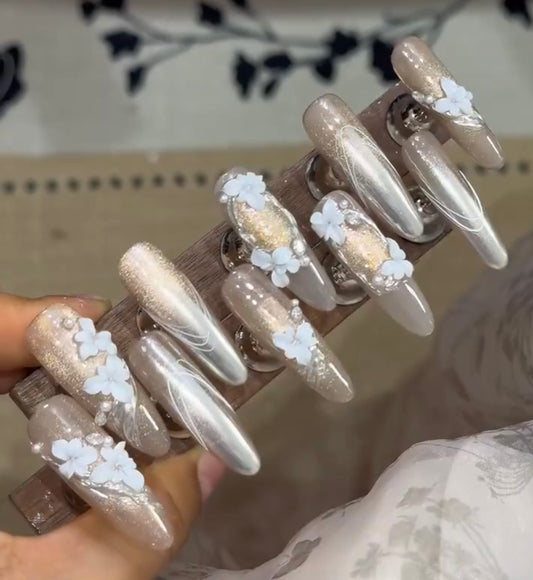 White carved nails in autumn