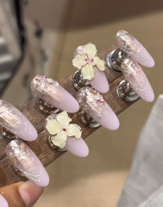 Yellow flower purple kis carved flower nails