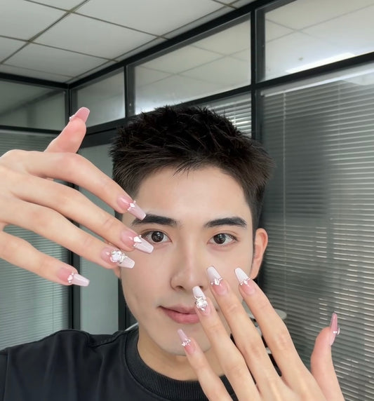 Elegant Pink French Manicure with 3D Gem Accents