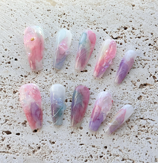 Clouds and mist stain the nails.