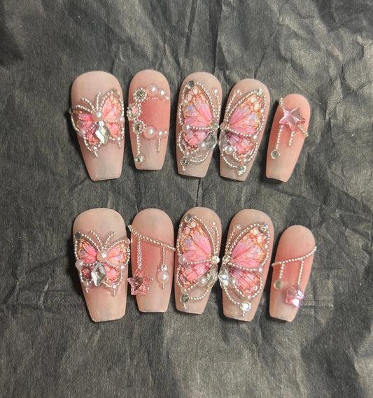 Pink butterfly manicure