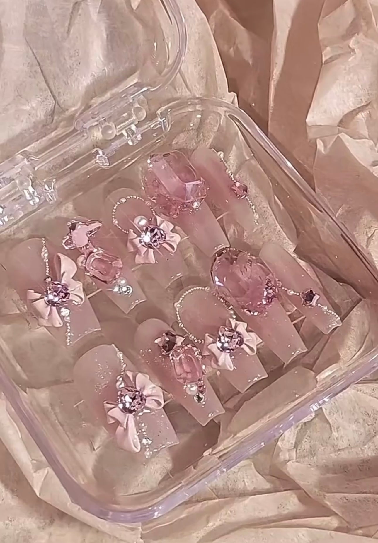 Pink Swarovski crystal Barbie nails.