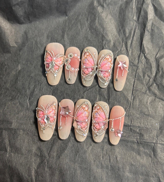 Pink butterfly manicure