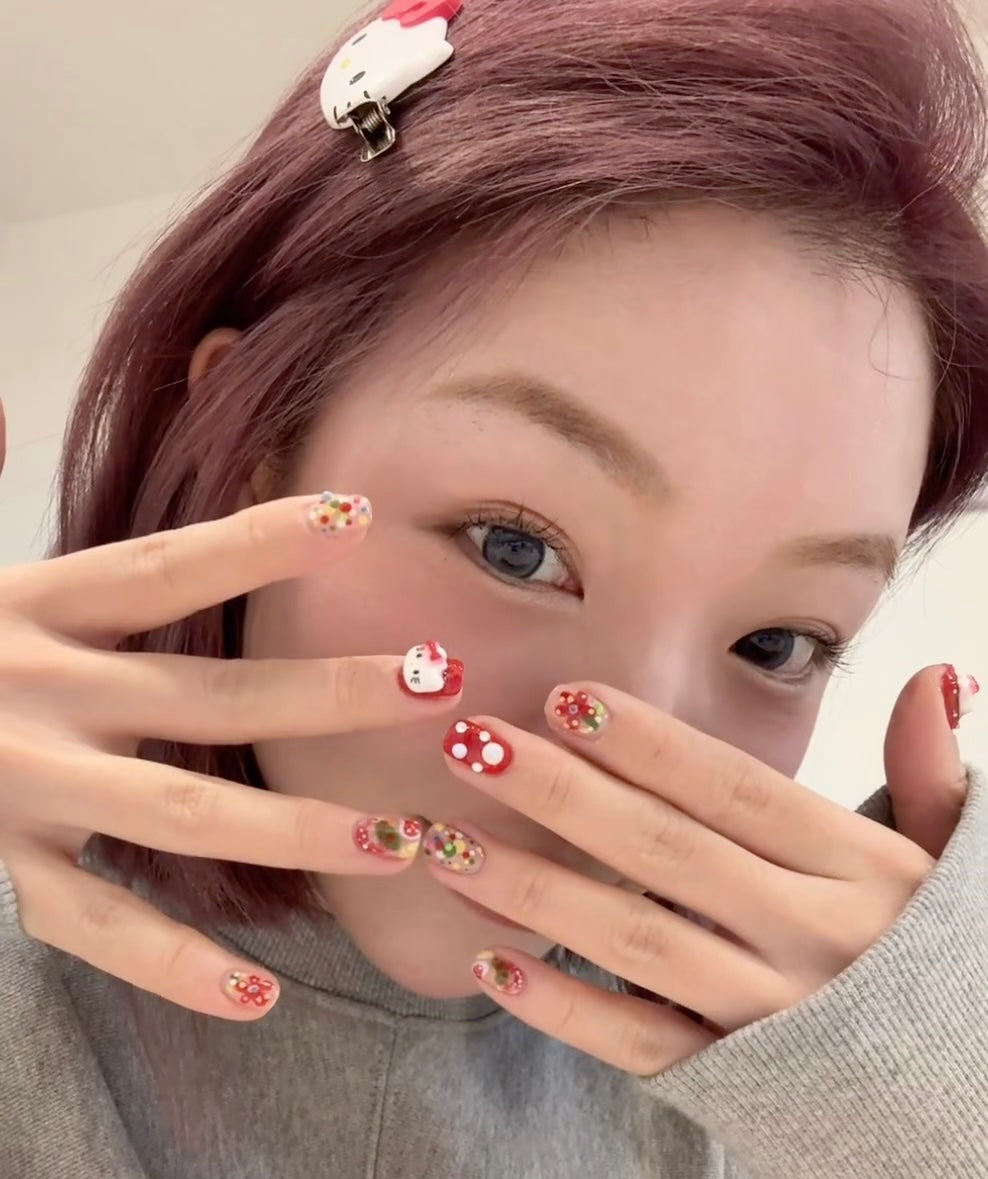 Red hello Kitty New Year's nails