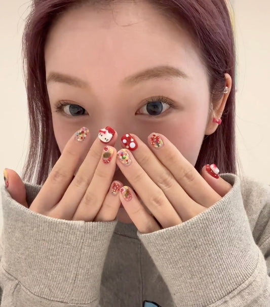 Red hello Kitty New Year's nails