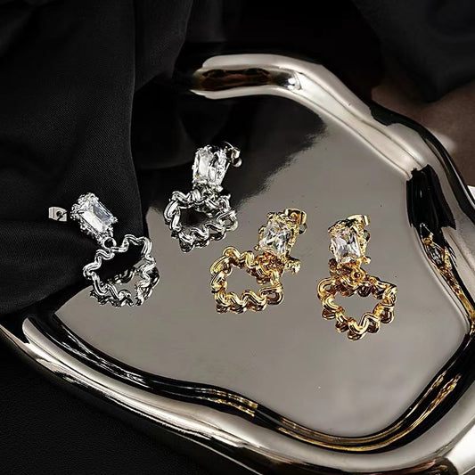design twisted metal zircon 18k gold earrings South Korea autumn and winter hundred with earrings