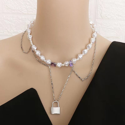 French light luxury designer shaped pearl necklace high sense metal tassel chain lock pendant sweater chain