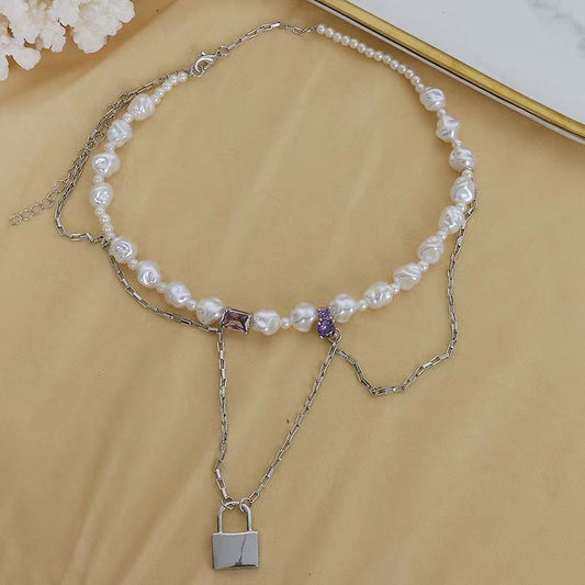 French light luxury designer shaped pearl necklace high sense metal tassel chain lock pendant sweater chain