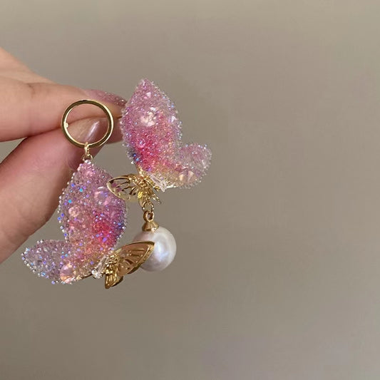 Super fairy cute pink butterfly pearl earrings female Japanese and Korean design senior sense niche earrings earrings summer