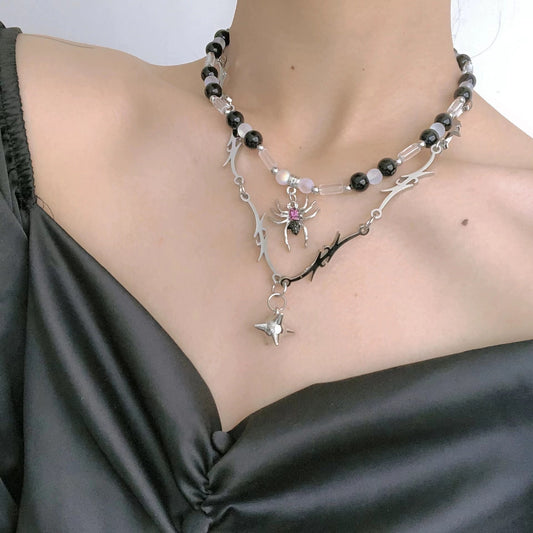 Dark high street with diamond spider pendant round bead necklace