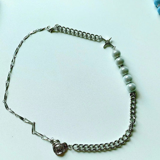 Reflective blue and white pearl cross patchwork necklace