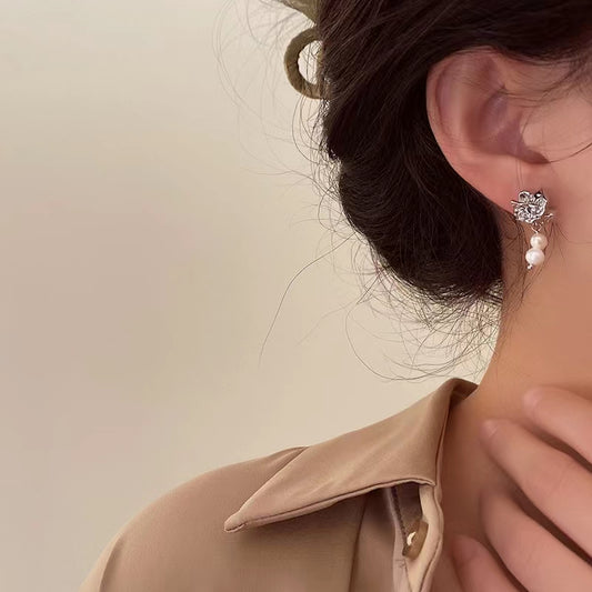 Sea waves mysterious sense of asymmetric freshwater pearl tassel earrings