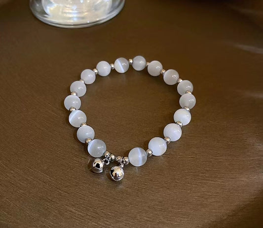 Cat's eye stone aubergine drop bracelet with diamonds