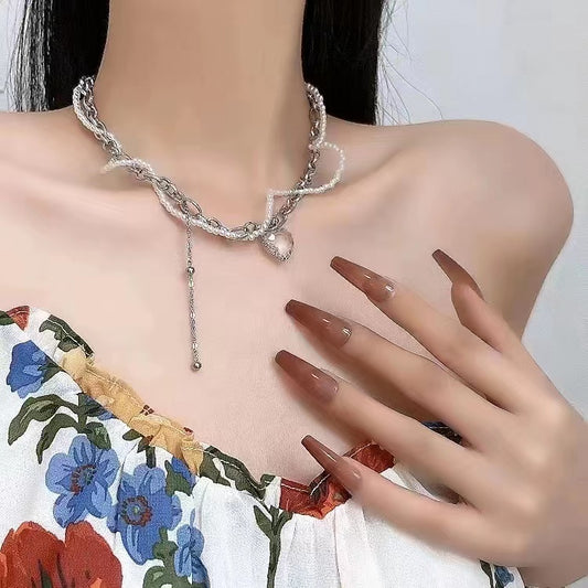 Double pearl love tassel necklace