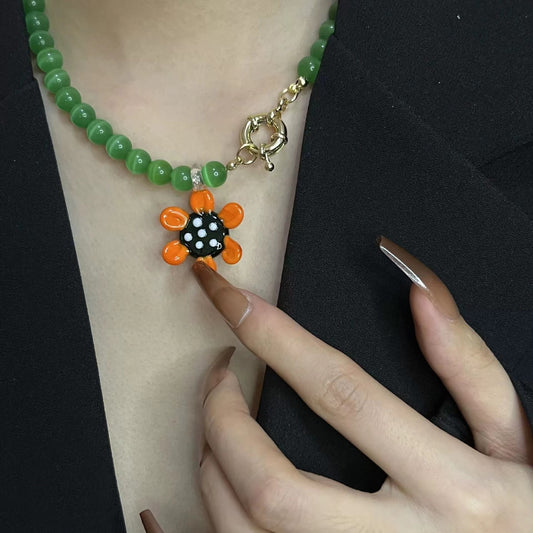 Craftworks cat's eye stone resort style handmade glass colorful flower necklace
