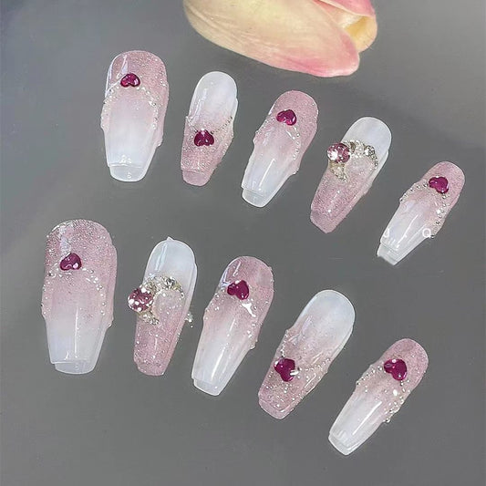 Handmade custom nails with small diamonds and cute hearts