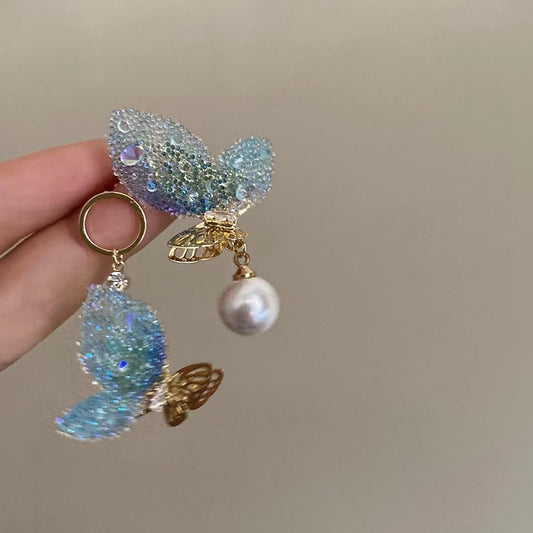 Super fairy cute pink butterfly pearl earrings female Japanese and Korean design senior sense niche earrings earrings summer