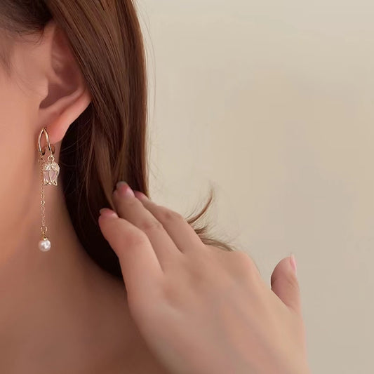 Misty flowers romantic cat's eye stone tulip pearl tassel earrings senior sense of light luxury Korean ladies earrings