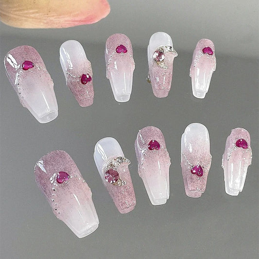 Handmade custom nails with small diamonds and cute hearts
