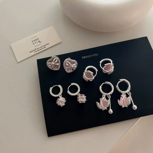 Niche design sense cat's eye stone tulip zircon earrings female vintage personality simple and matching temperament stud earrings