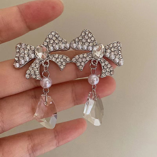 Pure desire girl light luxury senior sense zirconia bow earrings French delicate sweet niche pearl new tide