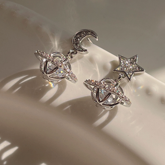 Asymmetrical sparkling stars and moons, three-dimensional micro-set zircon, exquisite and simple 925 silver earrings, female