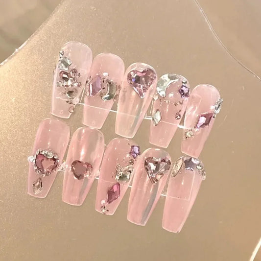 Artificial nails are worn by hand, showing white and pink French flash diamond rose lovers' manicure wedding nails are removable