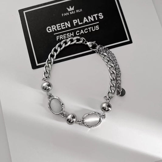 Cat's eye stone patchwork metal bracelet