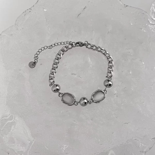 Cat's eye stone patchwork metal bracelet