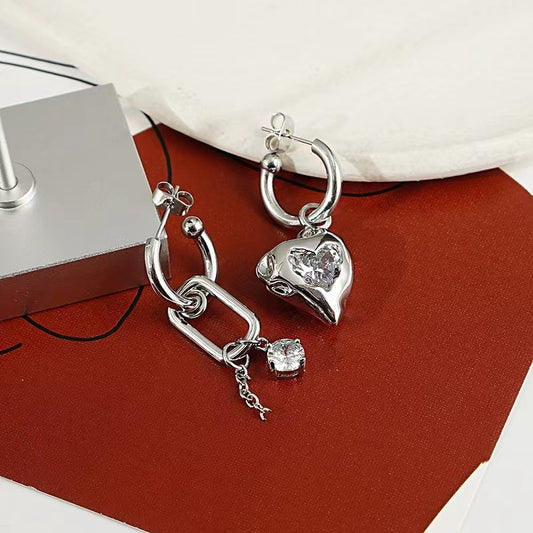 Cold wind earrings female ins wind exaggerated asymmetric silver zirconia earrings 925 silver pin senior sense of love earrings