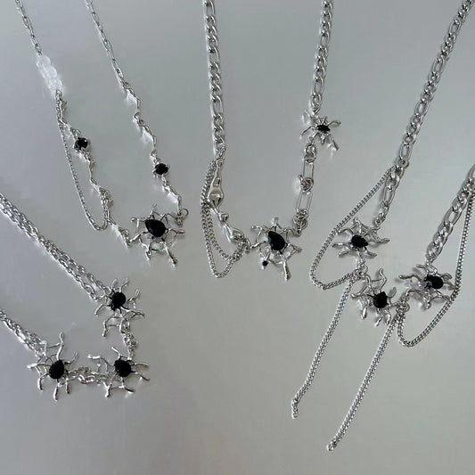 Liquid spider web tassel necklace