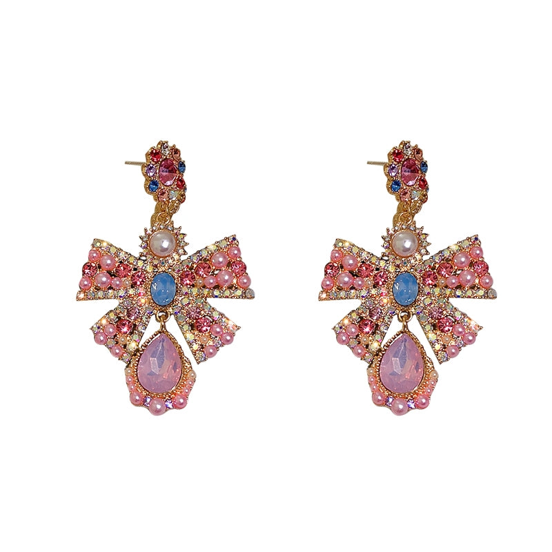 Pink exaggerated pearl bow earrings, unique design sense, light luxury earrings, evening dress earrings, female
